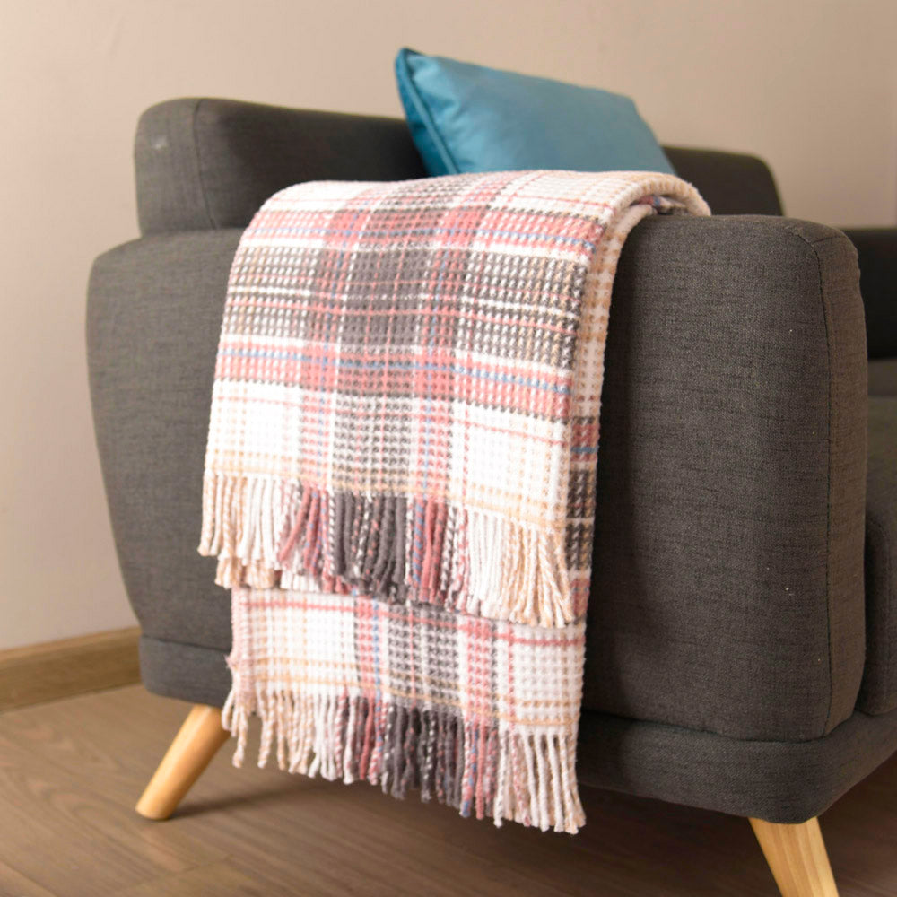 Scotch Throw Blanket adding a pop of color to a living room