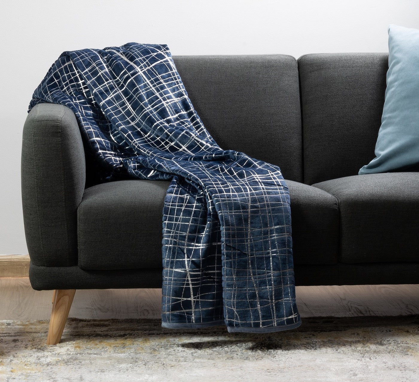 Plush luxury throw blanket featuring a soft embossed pattern