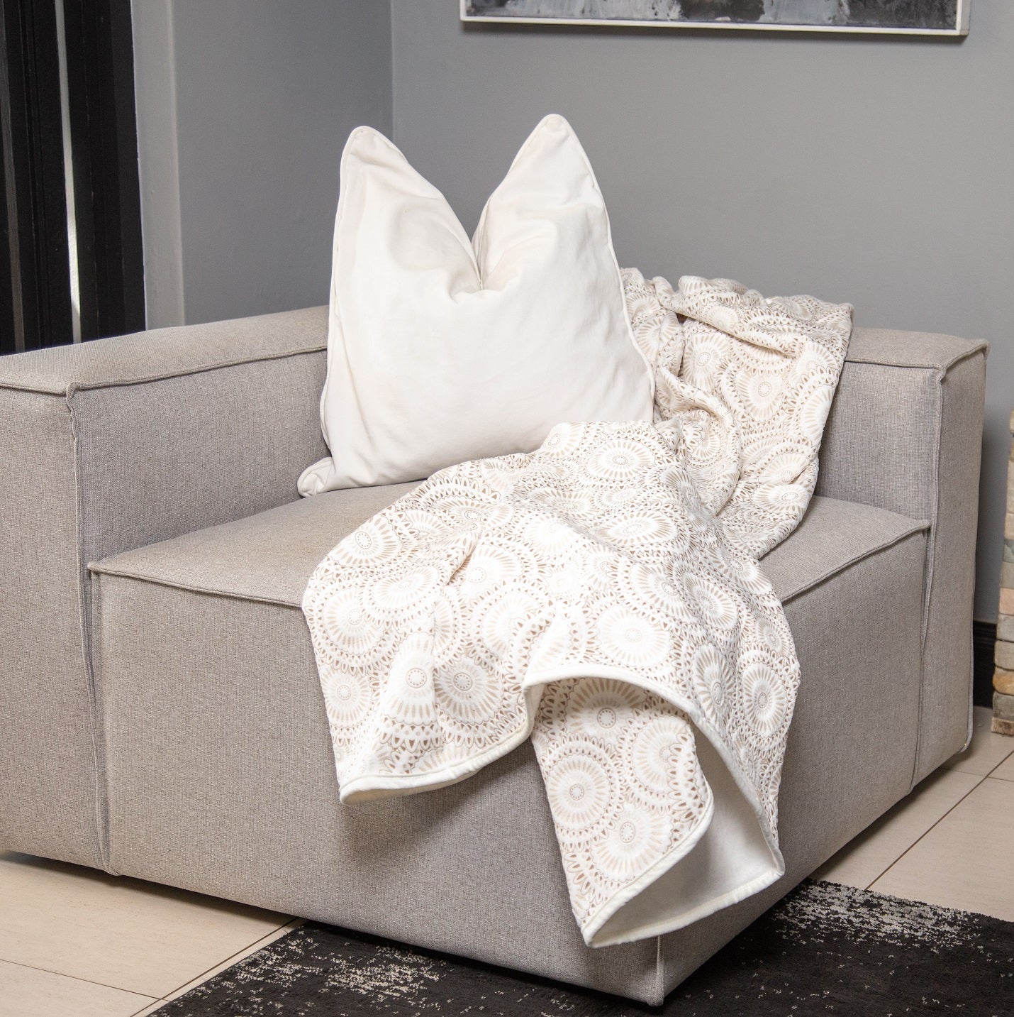 Plush Luxury Throw Blanket placed on sofa, cozy and decorative for living room