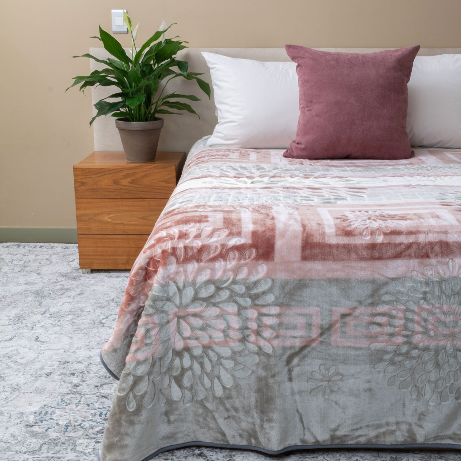 Stylish Amigo mink blanket on a queen-size bed