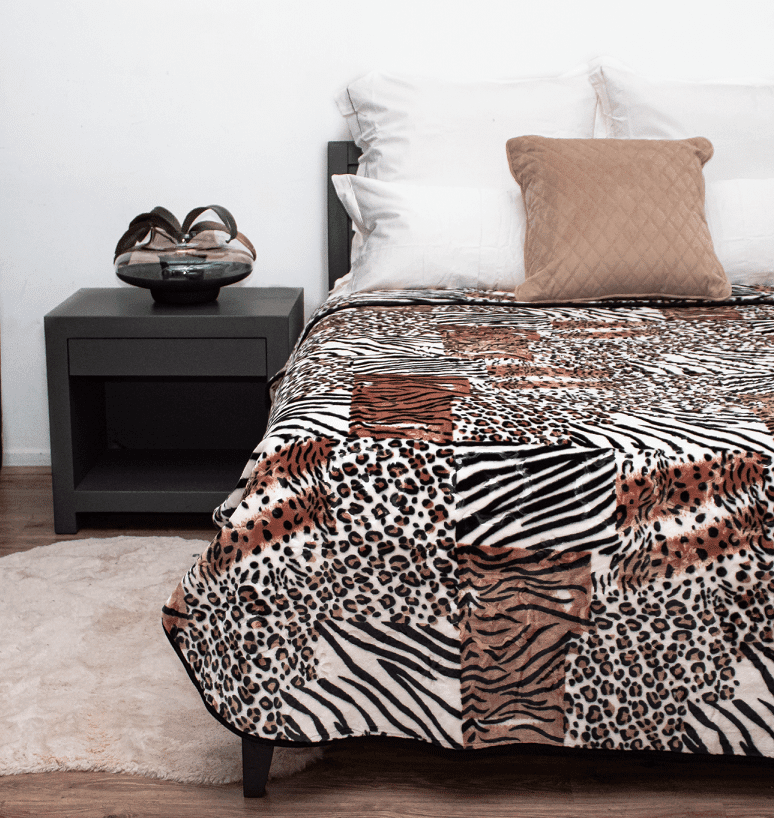 Faux Mink Blanket King Size displayed on a king bed for a cozy look, leopard print blanket, zebra prink blanket, brown blanket, black and brown blanket, cheetah print blanket, luxurious blanket, tiktok blanket, instagram blanket, for you blanket 