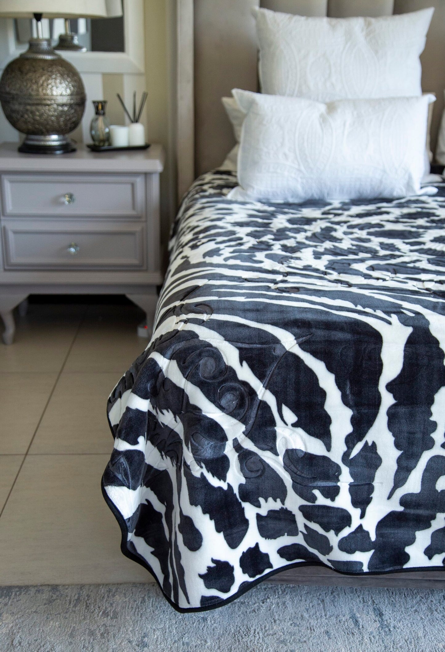 Paris Faux Mink Blanket Queen Size styled on a bed for a cozy look