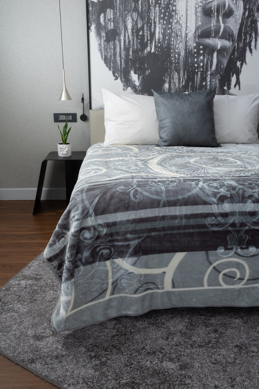 Close-up of the soft and silky texture of the Zoya Faux Mink Blanket