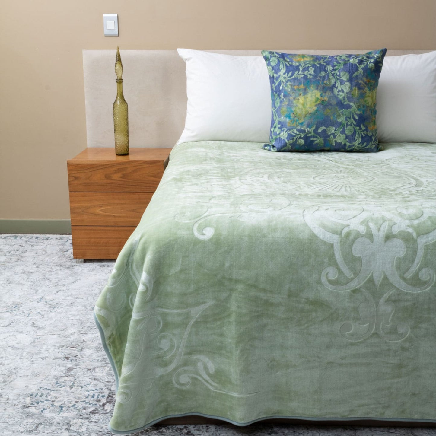 The softness and warmth of the Faux Mink Queen Blanket in a cozy bedroom setup